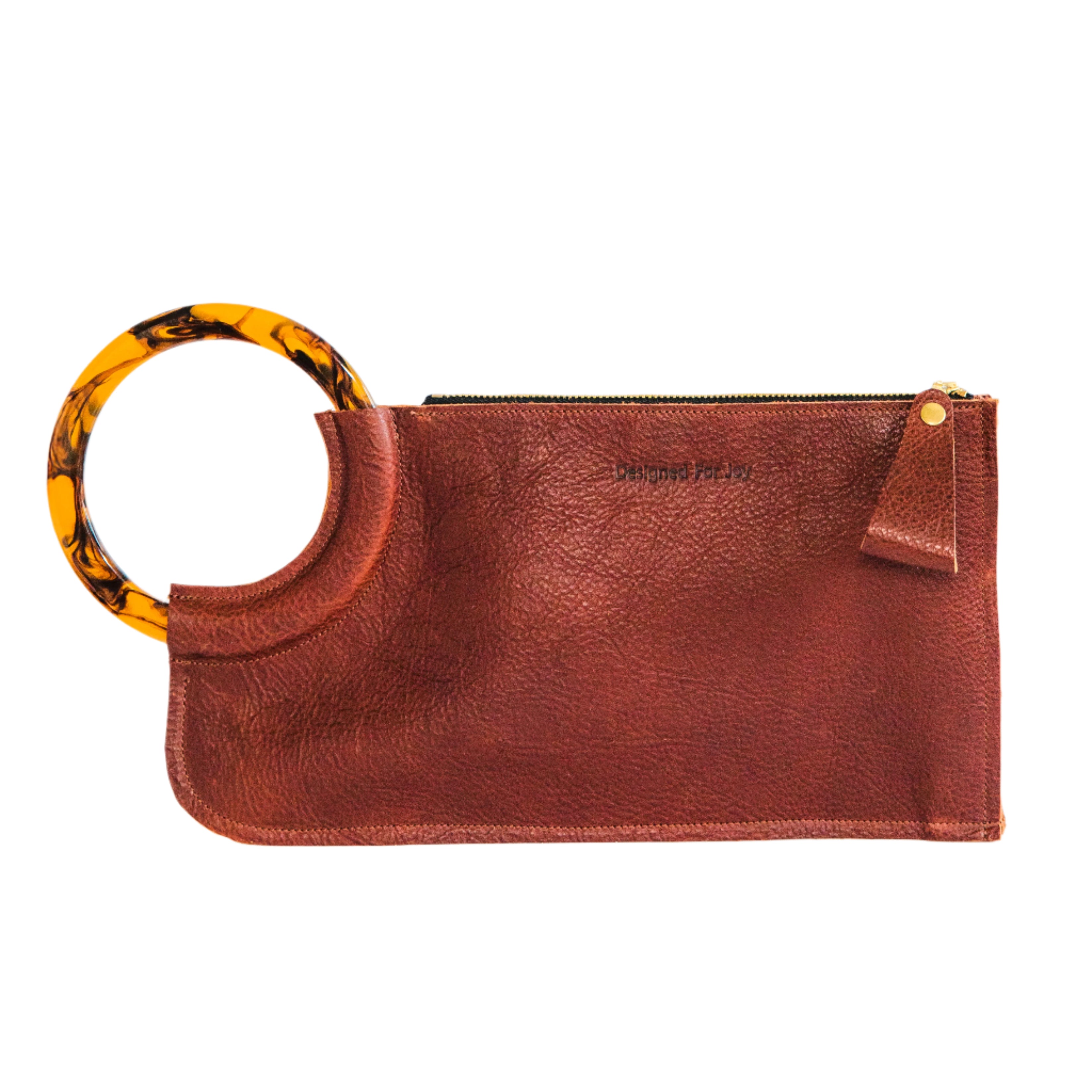 Cinnamon brown wristlet handbag with smooth resin handle and chunky zipper closure on a white background