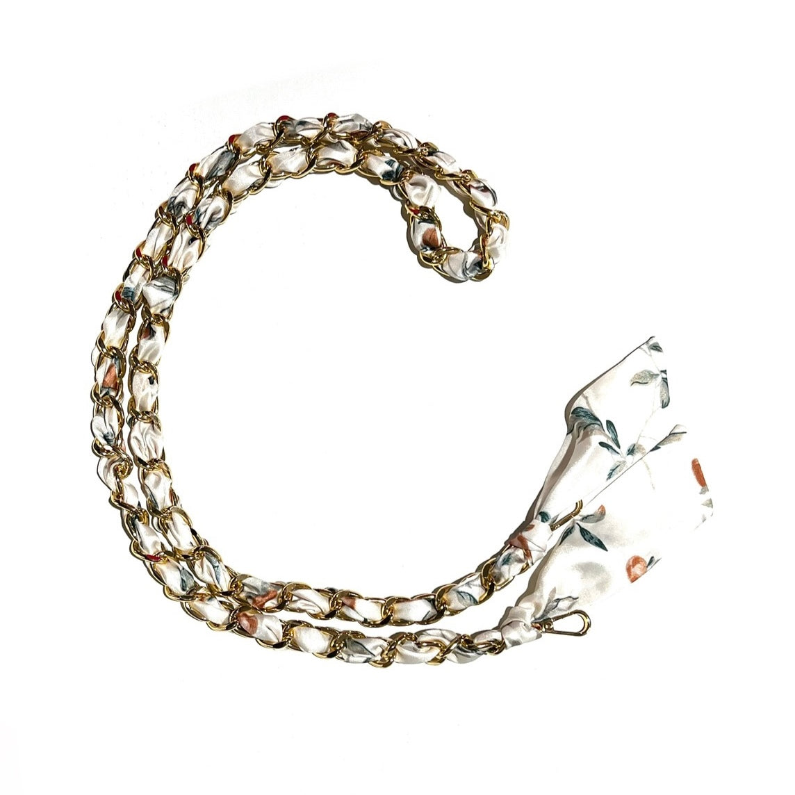 Off-white 48" long scarf chain strap with goldtone links and floral patterns displayed on a white background