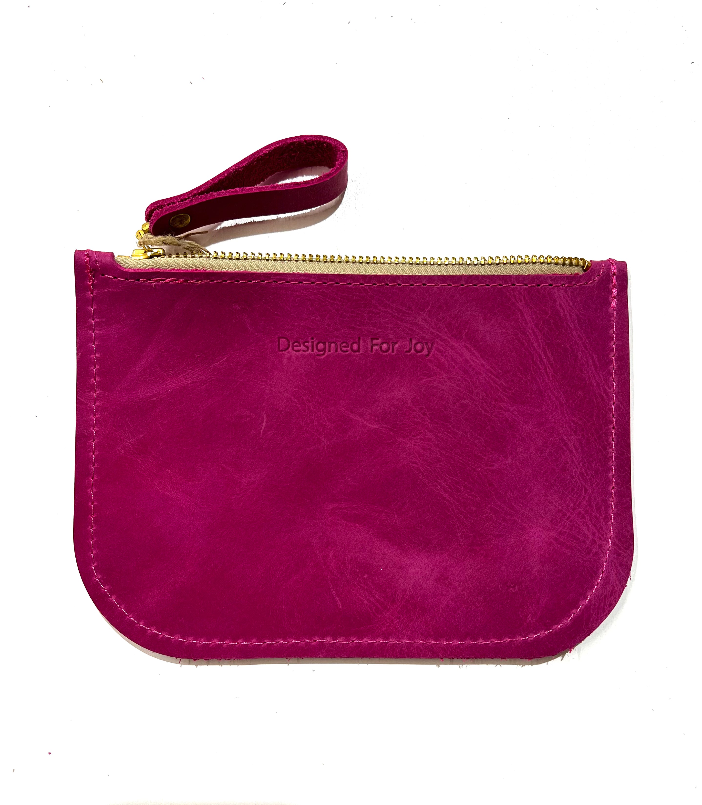Raspberry pink leather slim zipper coin purse, displayed on a white background