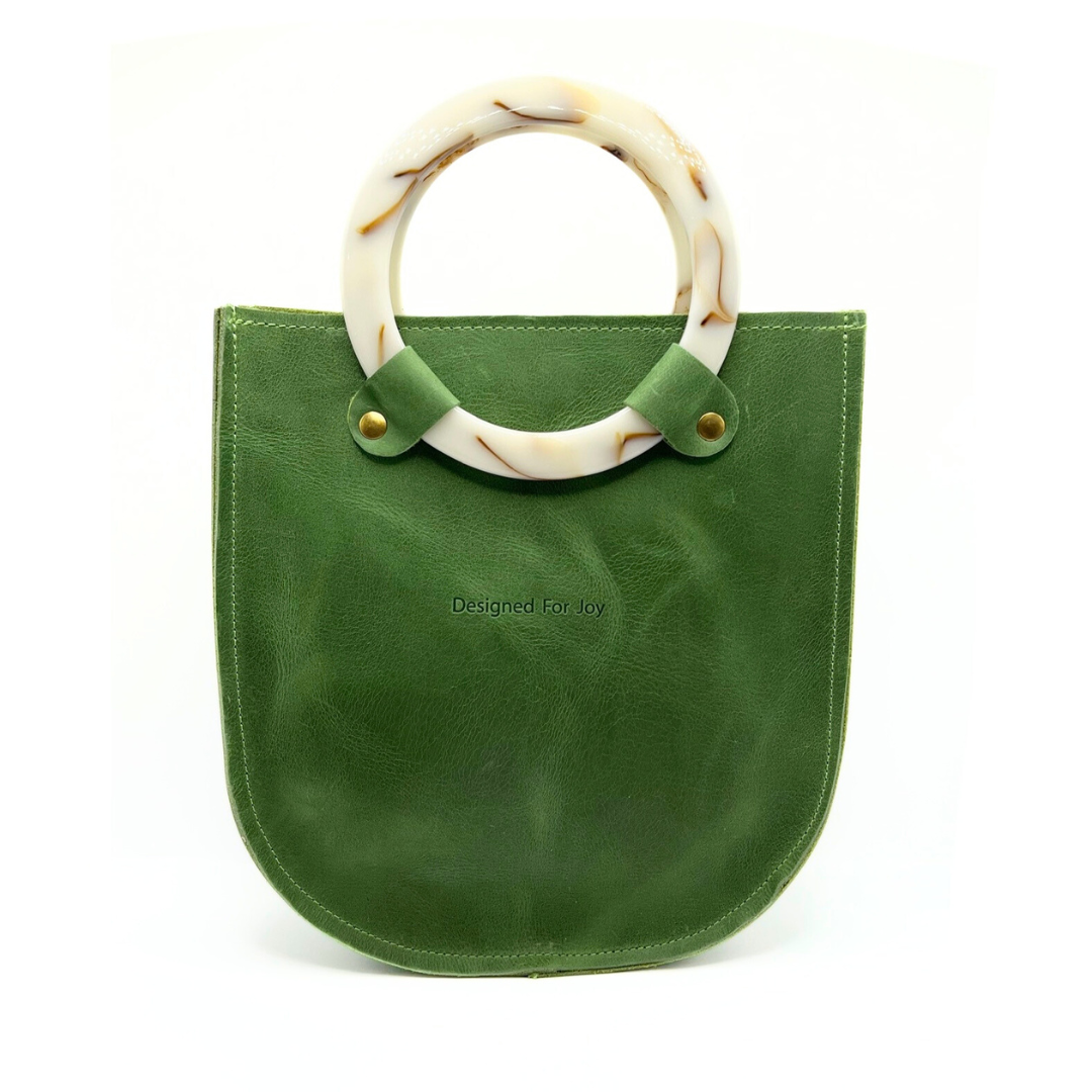 Evergreen top handle handbag with two resin handles and a smooth leather finish, displayed on a white background