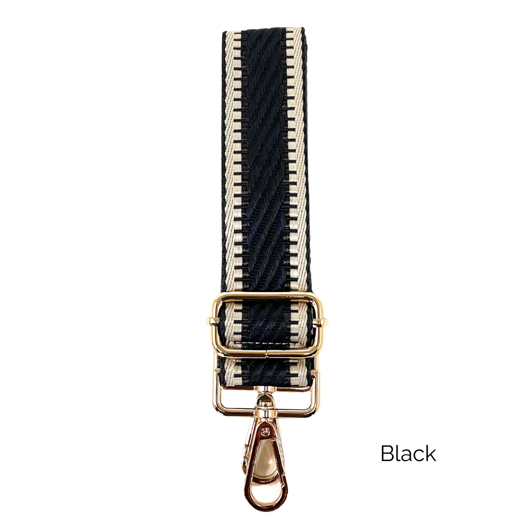 Black crossbody strap with metallic thread details and gold hardware on a white background