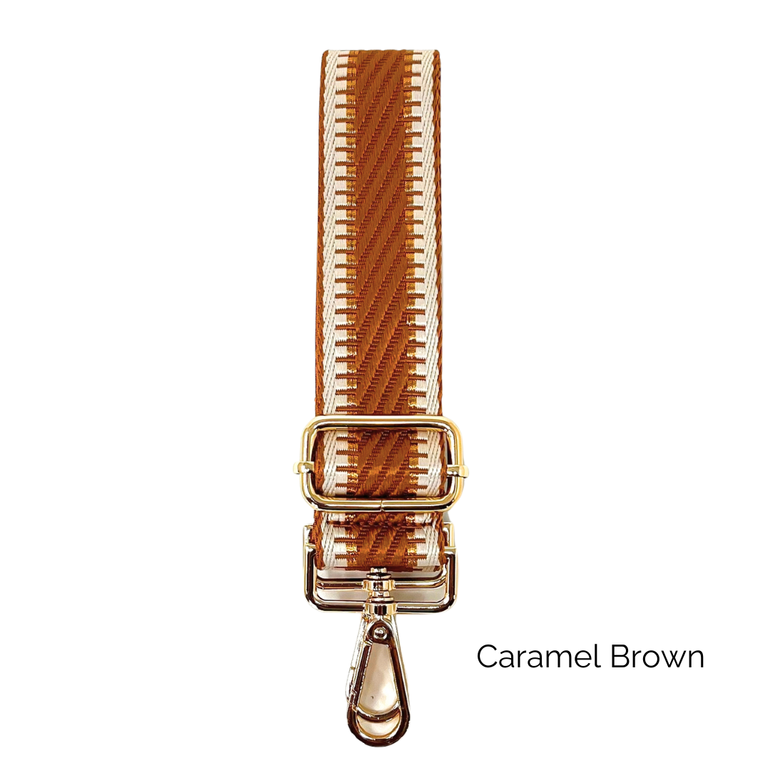 Caramel brown strap with metallic thread details and gold hardware on a white background