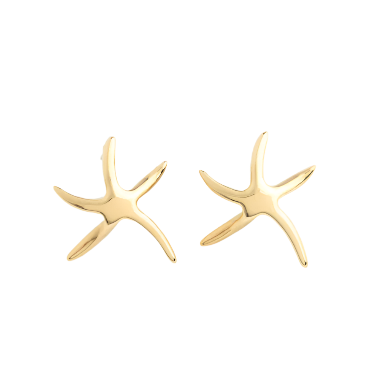 A pair of gold-colored starfish earrings, displayed on a white background