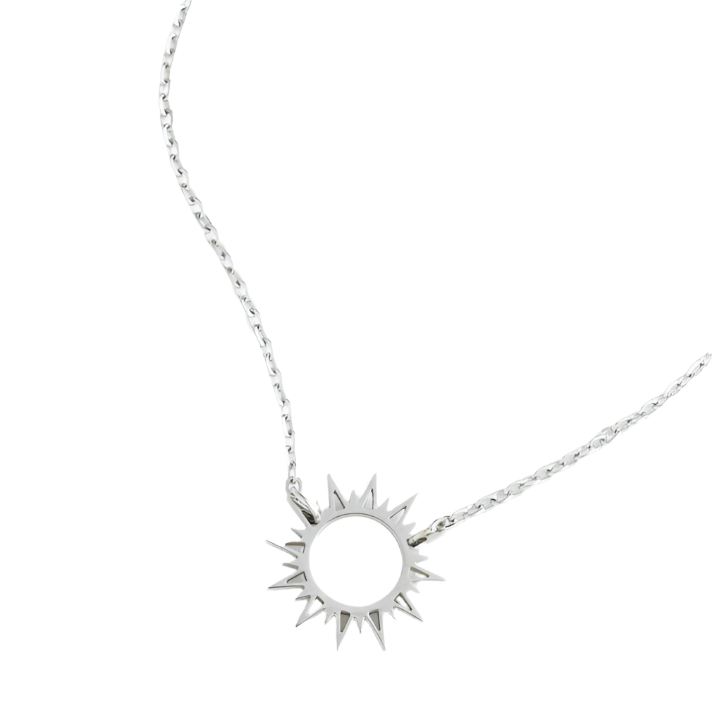 A silver-colored necklace with a sun pendant, displayed on a white background