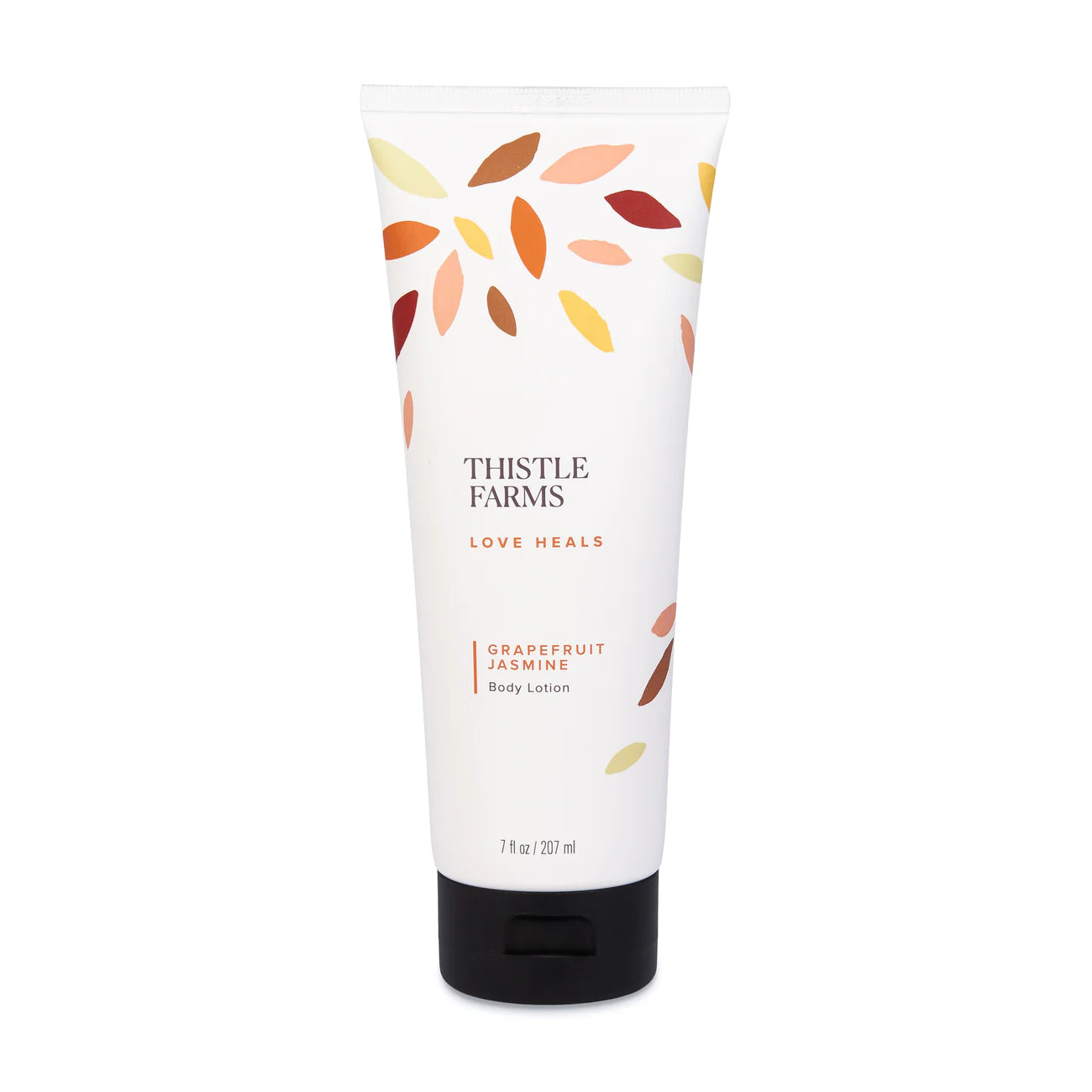 White tube of Thistle Farms Body Lotion labeled 'Grapefruit Jasmine' with leaf pattern, displayed on a white background