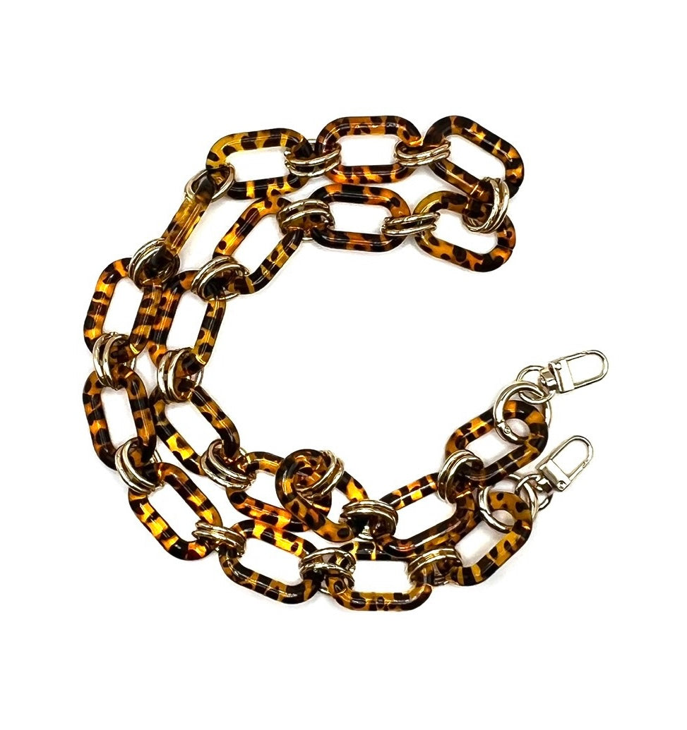 Tortoise shell acrylic chain crossbody handbag strap with gold accents and clips