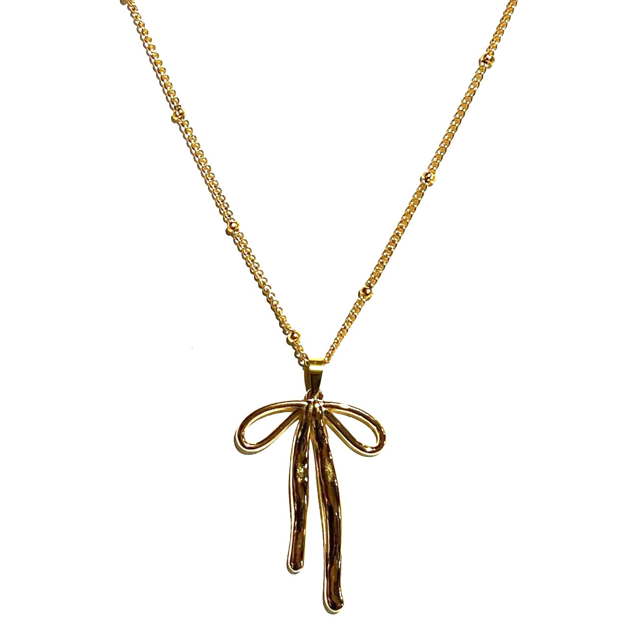 Gold bow charm necklace with a station chain displayed on a white background