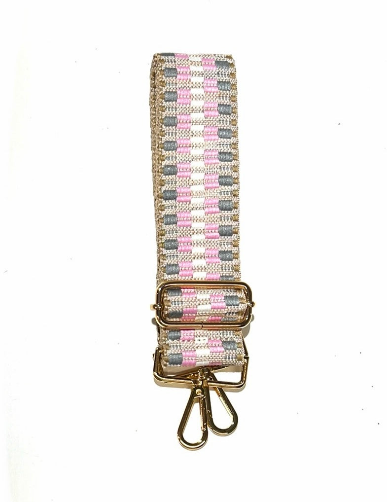 Gray and pink adjustable crossbody strap with metal hardware, displayed on a white background