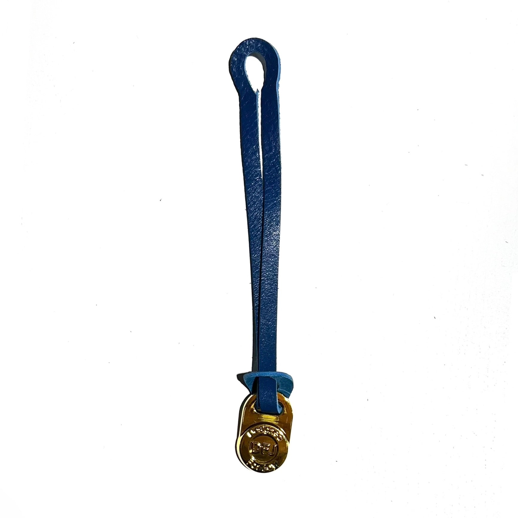 Blue leather bag charm with a gold-tone medallion on a white background