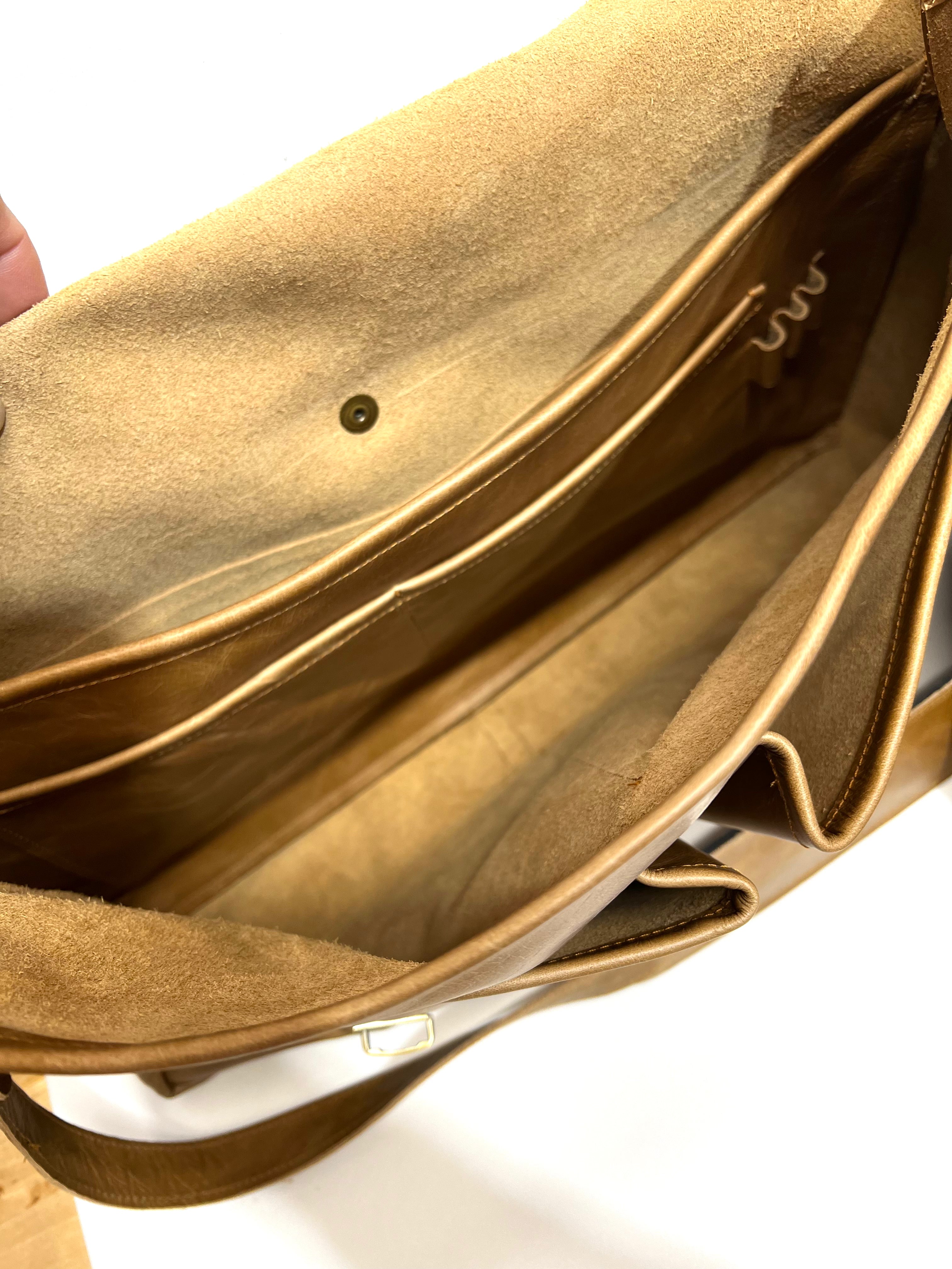 Inside a professional messenger/laptop bag featuring a suede interior