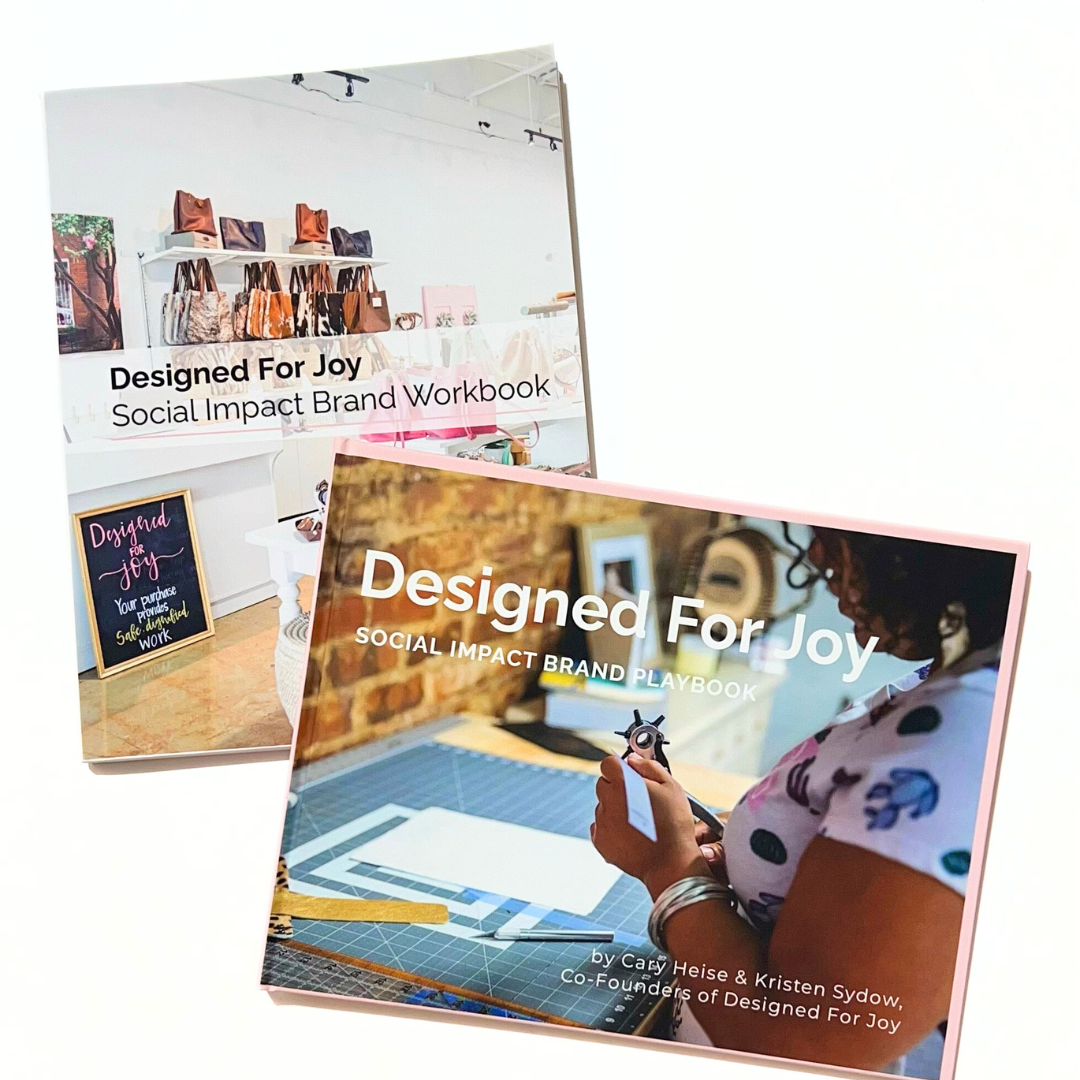 Workbook and playbook of 'Designed For Joy Social Impact Brand Course'. The book cover features a white background with text and a logo, while the workbook has a colorful design with images and text.