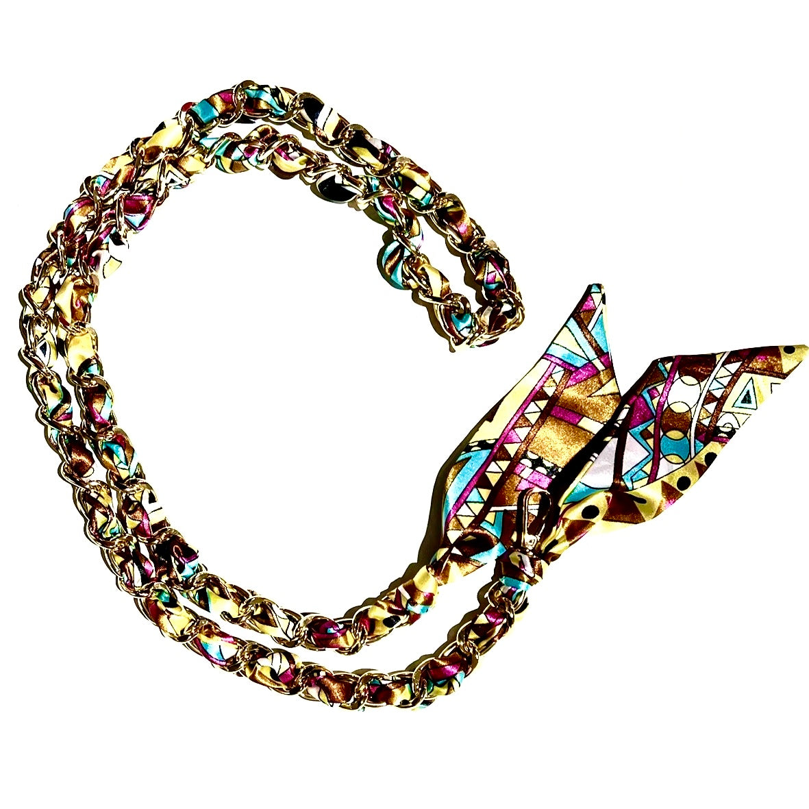Multi-colored 48" long scarf chain strap with goldtone links and retro pattern displayed on a white background