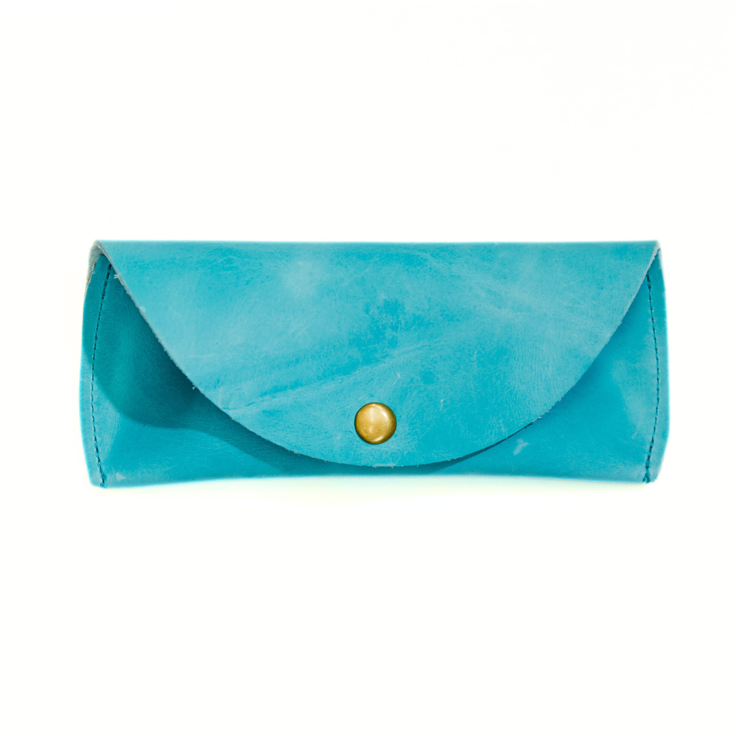 Aqua blue leather sunglasses case with a gold magnetic clasp, displayed on a white background