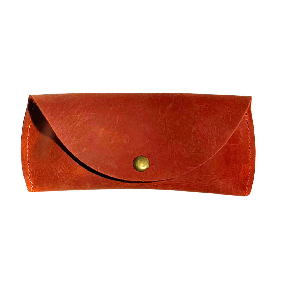 Persimmon brown leather sunglasses case with a gold magnetic clasp, displayed on a white background