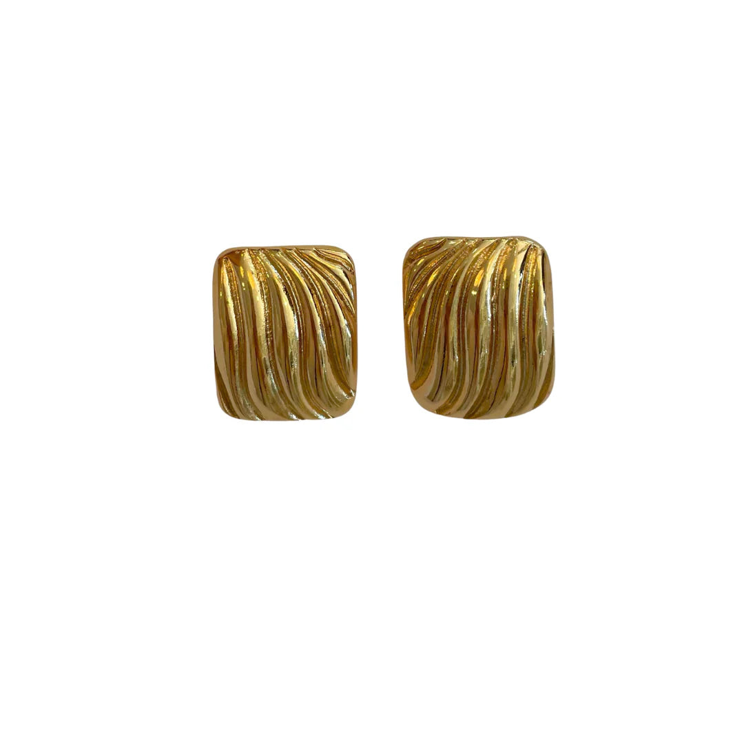 A pair of gold-colored rectangular stud earrings, displayed on a white background