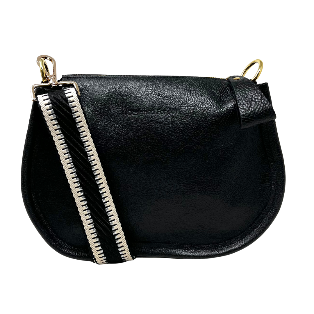 Black pebbled leather crossbody handbag with a smooth, chunky zipper and a crossbody strap