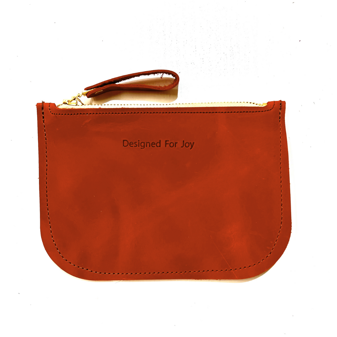 Persimmon leather slim zipper coin purse, displayed on a white background