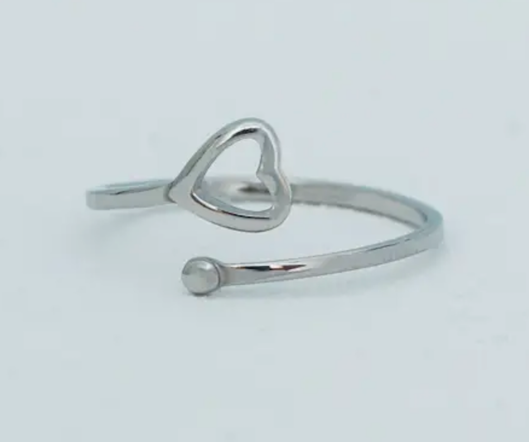Silver ring with a small heart. Adjustable in sizing.