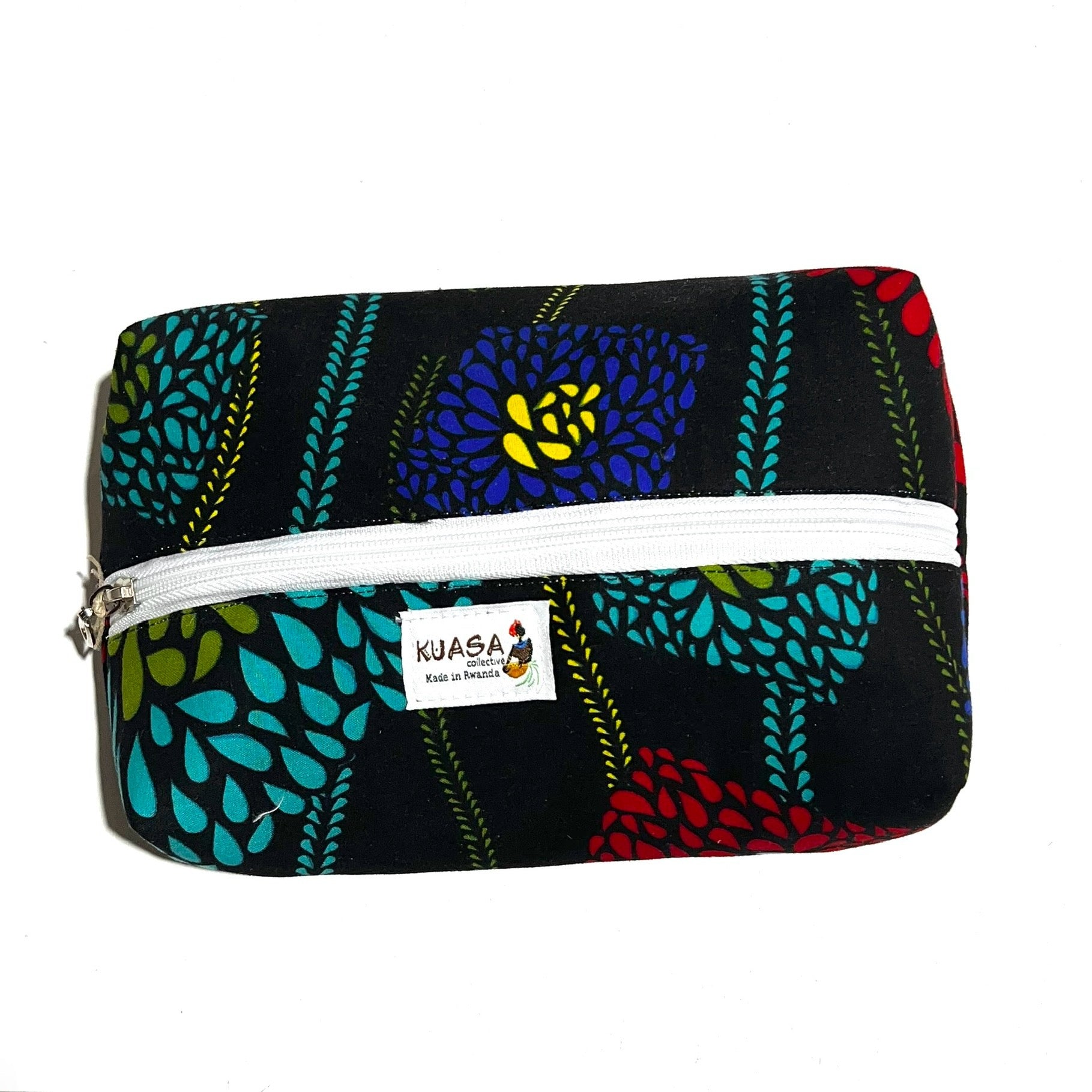 Black makeup bag with color flowers and a brand label 'KUASA' on a white background