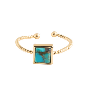 Square turquoise stone and gold ring.