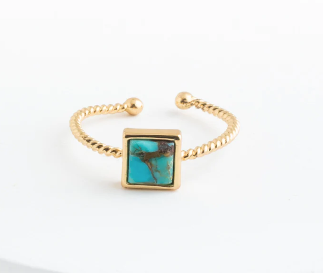 Square turquoise stone and gold ring.