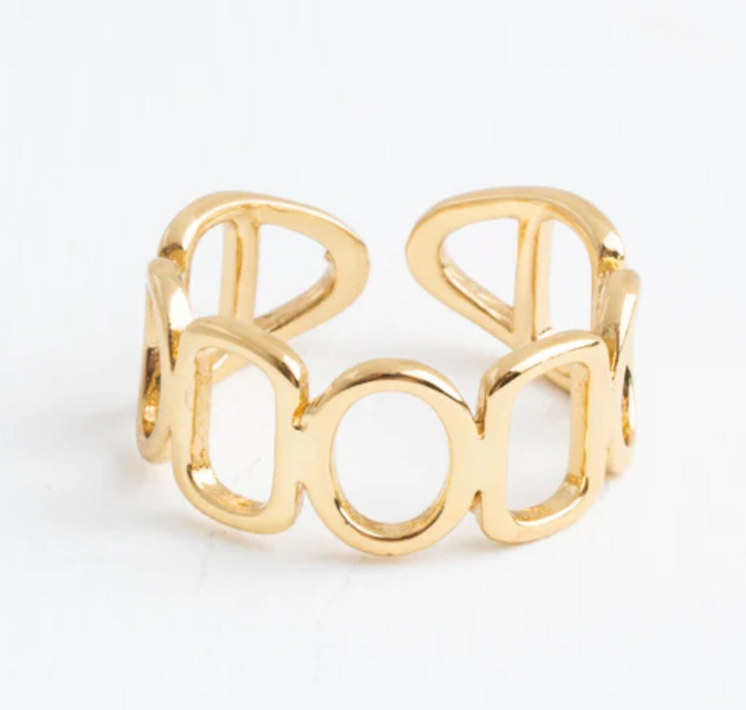 Gold ring with geometric shapes. Adjustable in sizing.