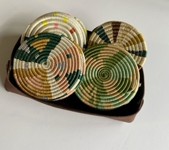 Woven multicolored coasters made in Rwanda