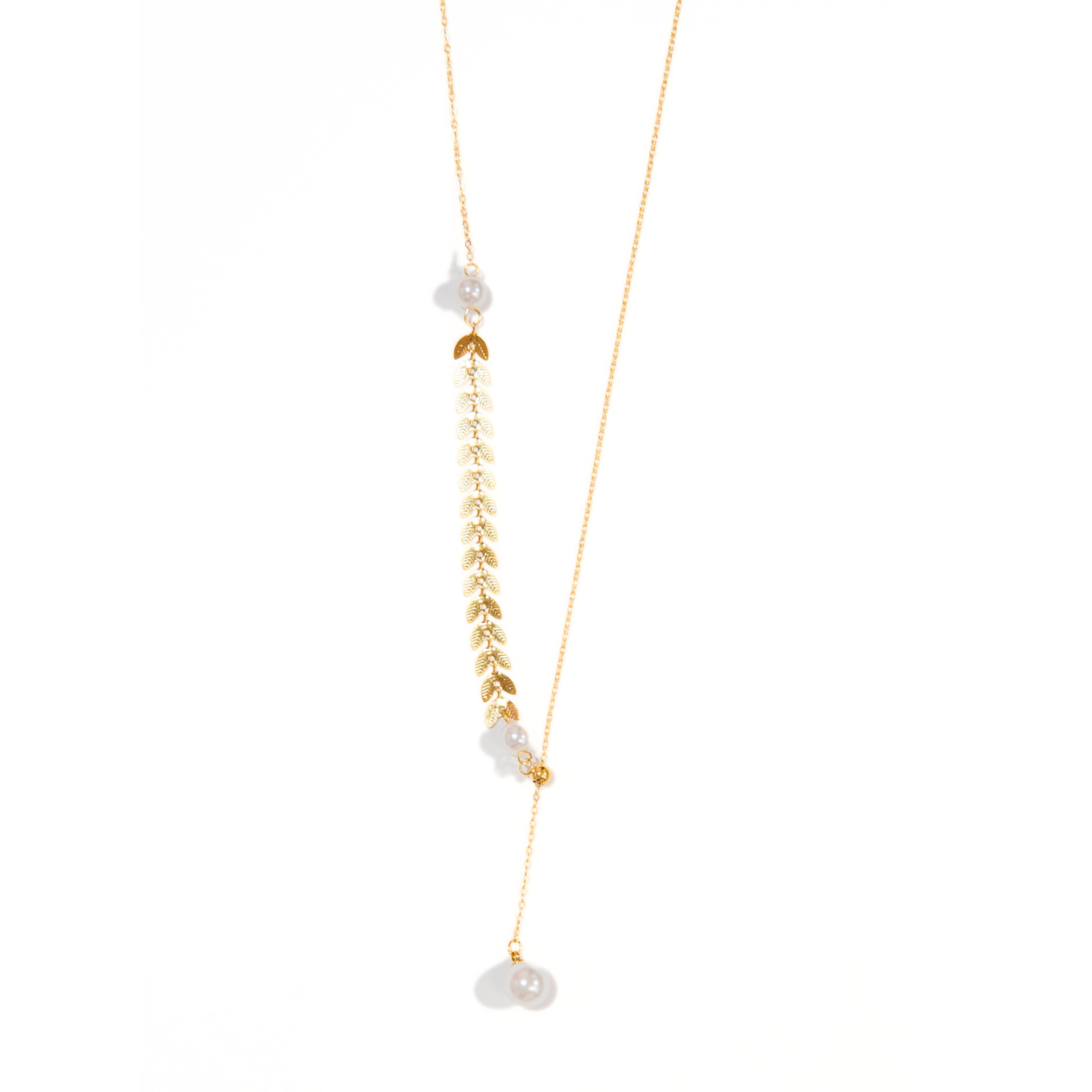A gold chain necklace with pearls and a chevron pattern, featuring a lariat closure, displayed on a white background