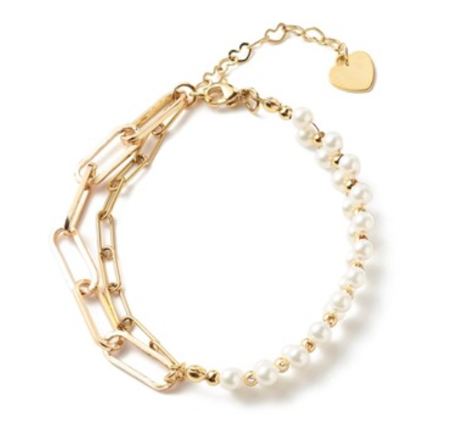 A two-tone bracelet with alternating gold links and white pearls, featuring a gold heart charm, displayed on a white background