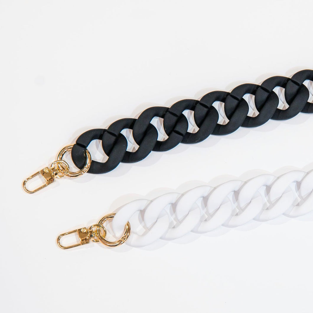 Crossbody chunky chains in both black and white.