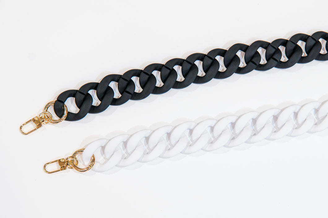 Crossbody chunky chains in both black and white.