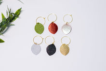 Wine charms in different colored leather